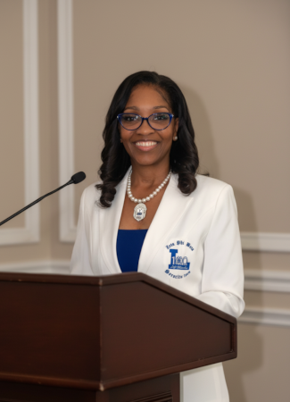 Dana Wilkerson Lynch at a podium